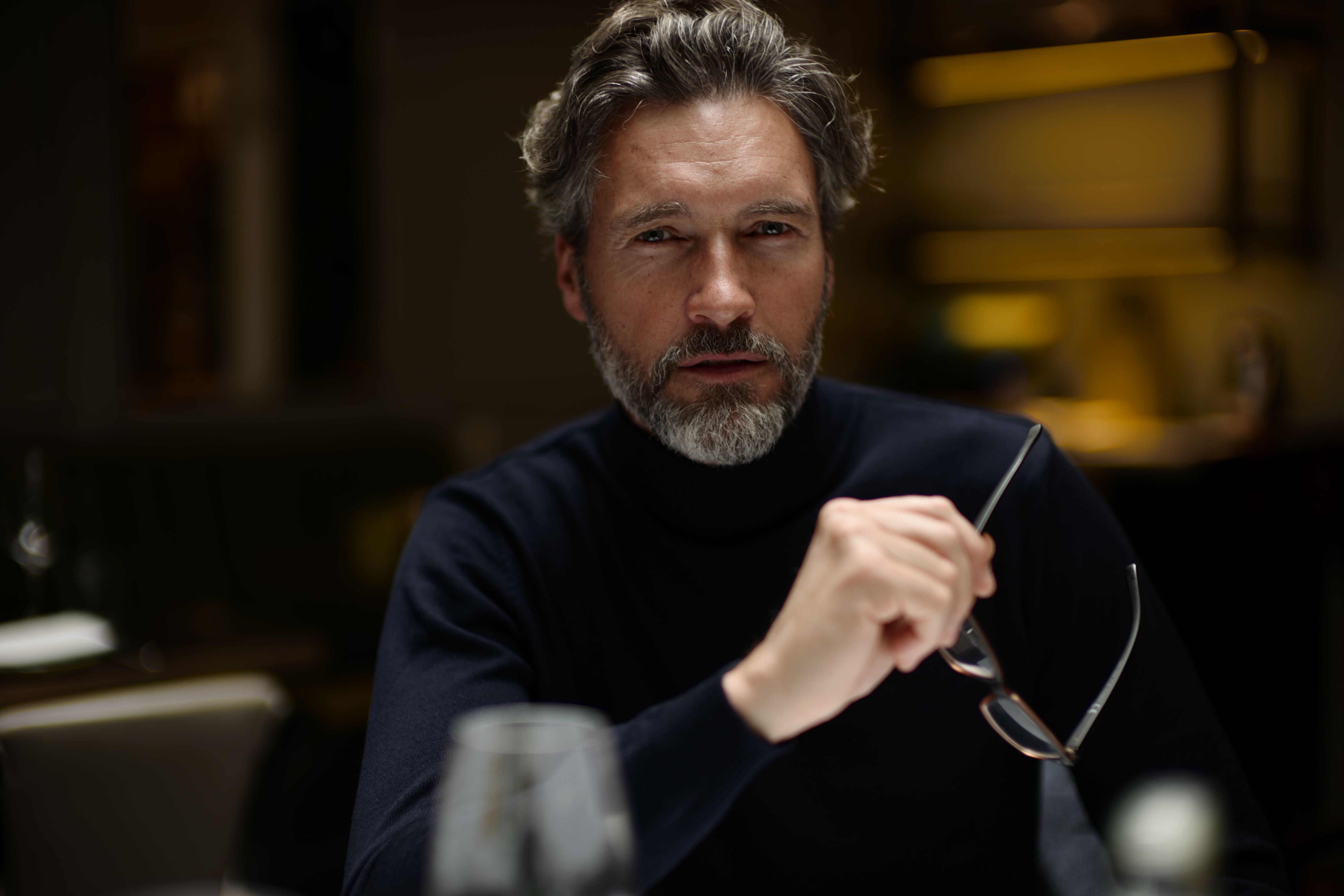 BEHIND EVERY WELL-DRESSED MAN